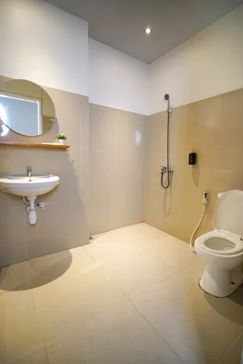 غرفة ديلوكس بسريرين منفصلين، Hotel Santoso Blora 3/3