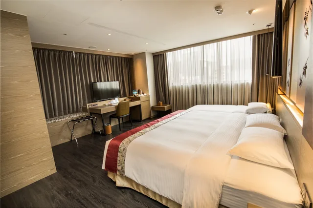غرفة ديلوكس بثلاثة أسرّة مع سرير إضافي، Green World Hotel Grand Nanjing 5/7