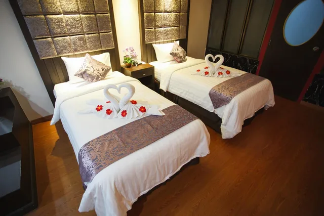 غرفة ديلوكس بسريرين منفصلين، Grand Pink Hotel Hat Yai 1/6
