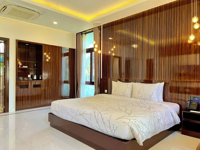 جناح عائلي بسريرين منفصلين وسرير كينج بإطلالة على البحر بغرفتي نوم، Carmelina Beach Resort 4/10
