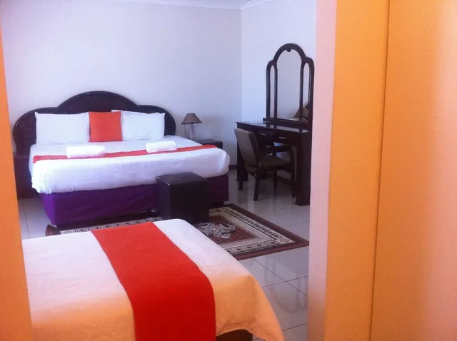 غرفة عائلية بسرير مزدوج وسرير فردي بإطلالة على الحديقة، Upper Room Guest House 3/4