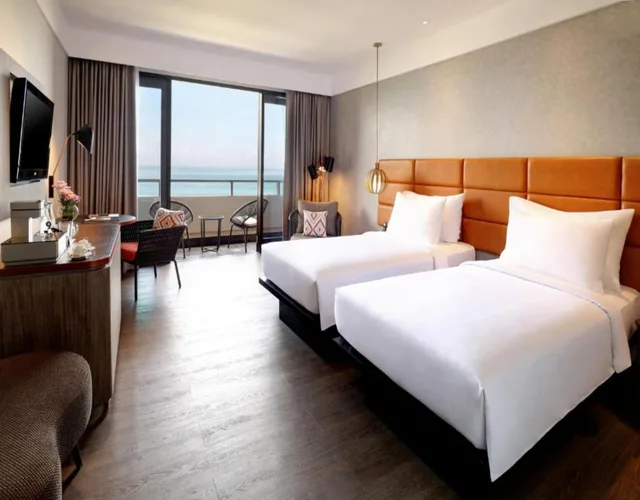 غرفة بريميوم ديلوكس بسريرين منفصلين بإطلالة على البحر، Pullman Bali Legian Beach 1/5