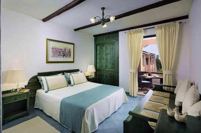 غرفة بسرير مزدوج أو سريرين منفصلين، CALA GINEPRO RESORT AND SPA 1/4