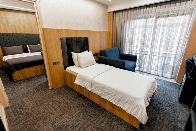 2 Bedrooms, Deluxe, Suite, 1 Double and 1 Single Bed, 2 Bathrooms, 2 Sofa، Fengo Hotel 1/8