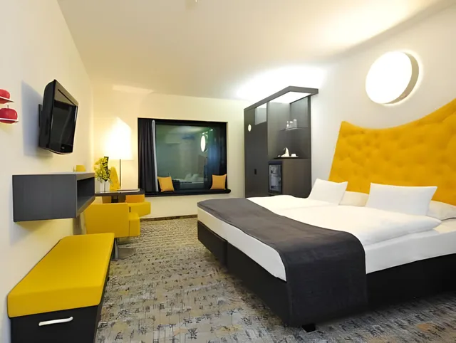جناح جونيور ثلاثي بسرير كينج مع أريكة، Arcotel Onyx Hamburg 1/1