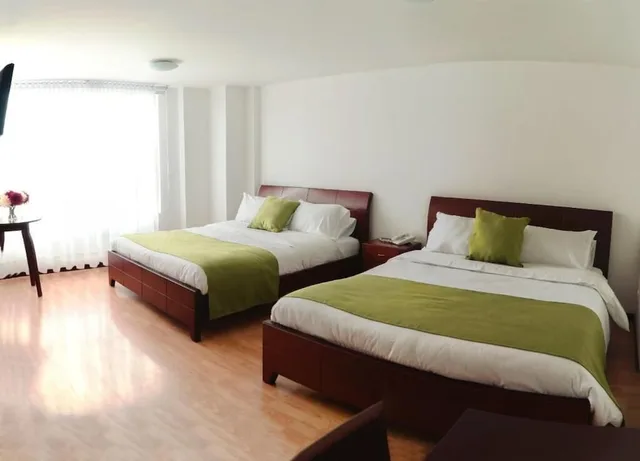 Room, 2 Queen Beds, Nogal Suite Hotel Pasto 5/8