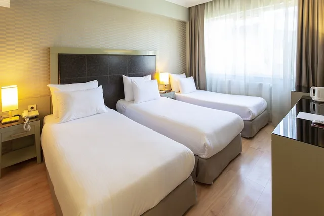 غرفة ثلاثية، Hotellino 1/9