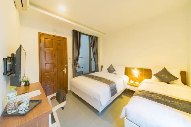 Mega, Triple, 1 Queen and 1 Single Bed، Stop And Go Boutique Homestay In Hue 3/7