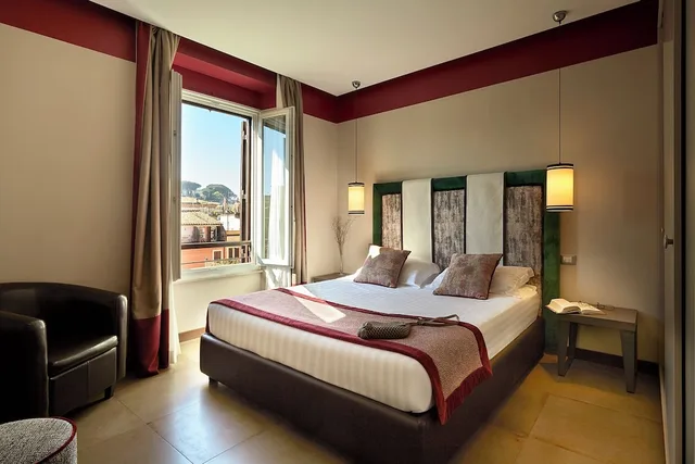 شقة سوبيريور بسرير مزدوج بإطلالة على المدينة بشرفة بغرفة نوم واحدة مع أريكة، Residence Trianon Borgo Pio 1/5