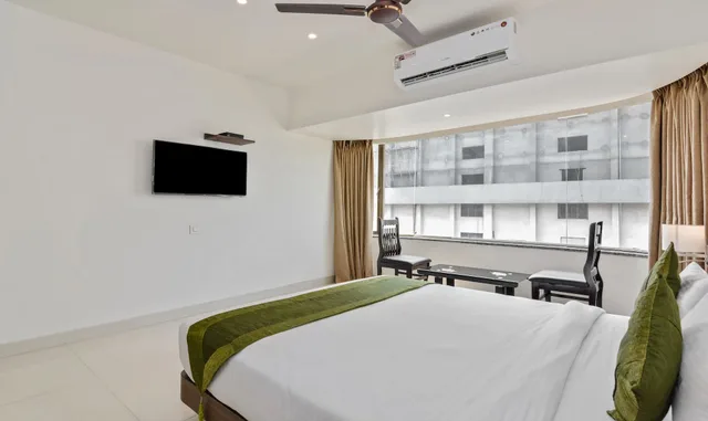غرفة قياسية بسرير كوين، Treebo Staycation Holiday 7/9