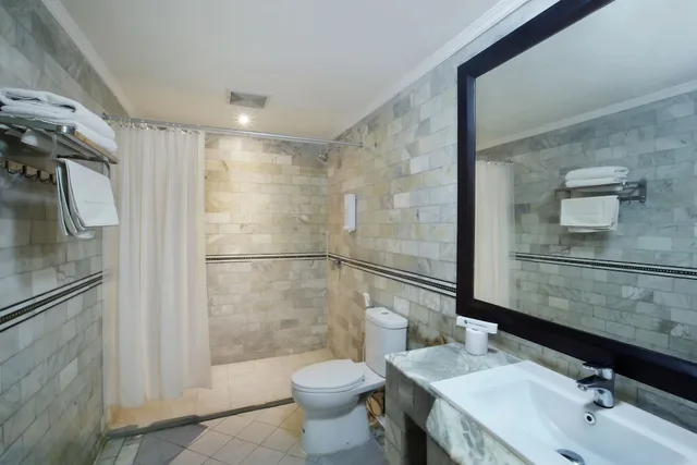 غرفة قياسية بسريرين منفصلين بإطلالة على الحديقة، Bali Bungalo Hotel 10/10