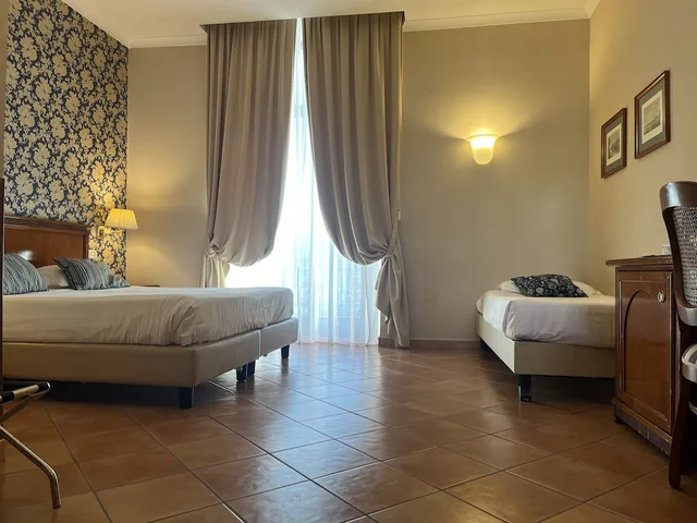 غرفة ثلاثية بسرير كينج وسرير فردي، Hotel Nuvo 1/9
