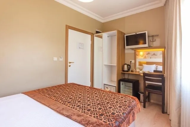 غرفة قياسية بسرير كوين وسرير مزدوج بغرفة نوم واحدة، TAYA HATUN HOTEL 3/10