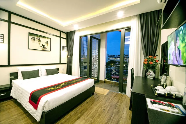 غرفة عائلية بإطلالة على النهر بشرفة، Hoi An Riverland Villa - Hoi An Center 2/2