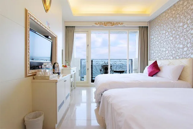 غرفة رباعية بسريرين مزدوجين بإطلالة على البحر، Sunrise Hotel 1/2