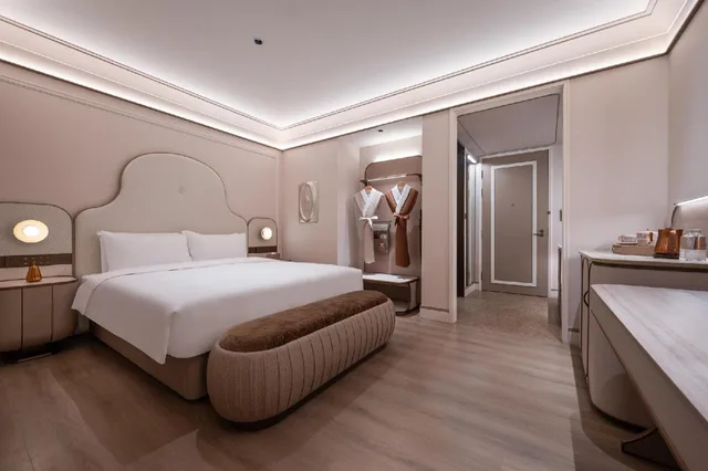 جناح ديلوكس بسرير مزدوج وسرير فردي، Mercure Hangzhou West Lake Yuquan 2/4