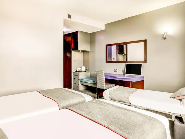 غرفة بسريرين منفصلين مع سرير إضافي، Sheffield Metropolitan Hotel by Belvilla 9/9