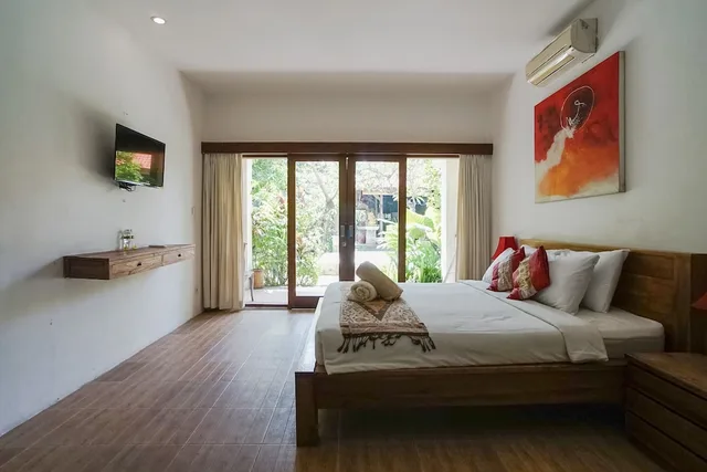 غرفة ديلوكس بسرير كينج بإطلالة على المسبح، D'uma Residence 2/5