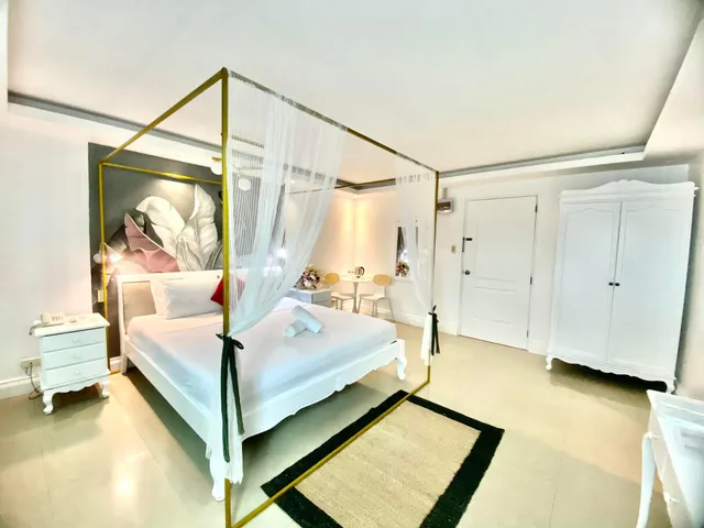غرفة بريميير بسرير كينج وسرير كوين، OYO 252 Hotel Euroasia 1/2