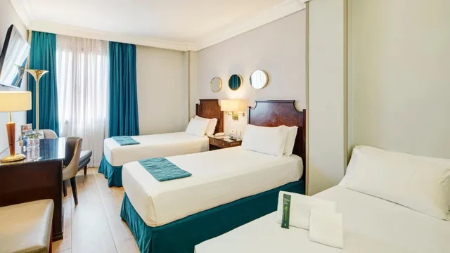 غرفة بسرير مزدوج مع سرير إضافي، Sercotel Gran Hotel Conde Duque 4/10
