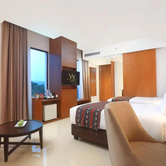 غرفة غراند ديلوكس بسريرين منفصلين، Wimarion Hotel Semarang 3/9