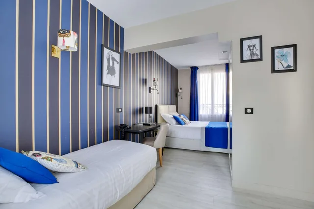 غرفة ديلوكس ثلاثية بسرير مزدوج وسرير فردي بإطلالة على المدينة، Hotel Riviera Elysees 4/10