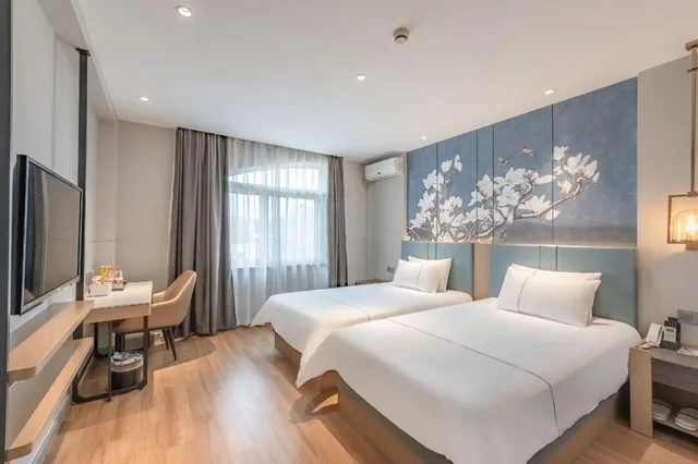 غرفة ديلوكس بسريرين منفصلين، Magnotel Hotel (Dalian Hang Lung Plaza Xi an Road Subway Station) 1/1