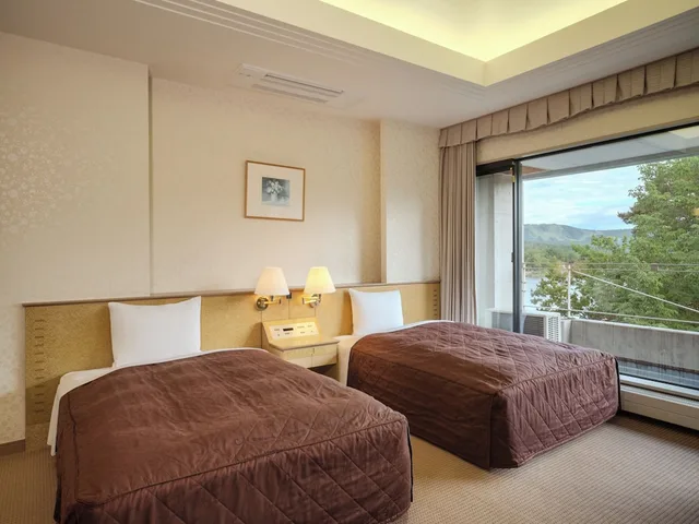 غرفة ديلوكس عائلية بسريرين منفصلين وسريرين مزدوجين مع أريكة، Hotel Anbient Tateshina 3/9