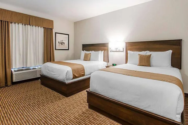 غرفة بسريرين كوين، Travelodge Suites by Wyndham Estevan 1/8