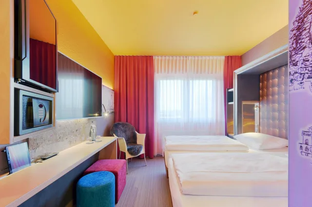 غرفة بسريرين منفصلين، Designhotel + Congress Centrum Wienecke XI 7/10