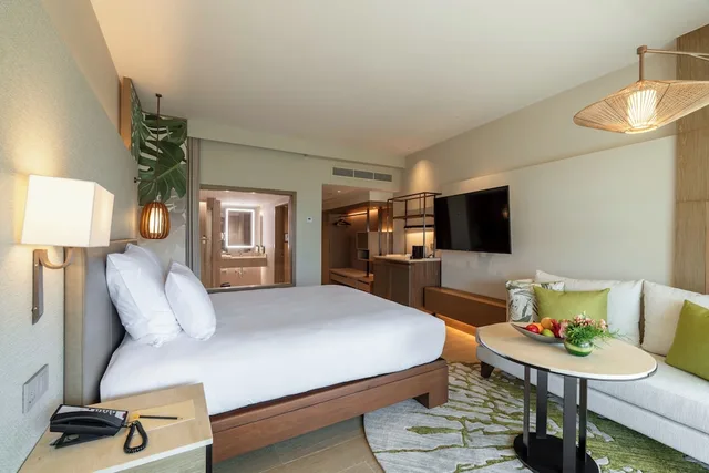 غرفة ديلوكس بسرير مزدوج بإطلالة على الحديقة، Pullman Phuket Karon Beach Resort 9/10