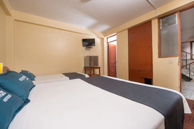 غرفة قياسية بسرير مزدوج وسرير فردي، Posada Inn 1/3