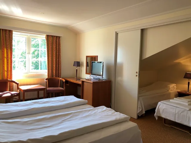 غرفة عائلية بسرير كوين مع أريكة، Klaekken Hotell 1/6