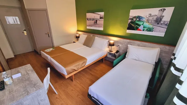 غرفة ثلاثية بسرير مزدوج وسرير فردي، Hotel Astoria Torino 3/10