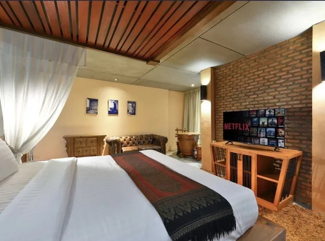غرفة بريميير بسرير مزدوج بشرفة، Fusion Suites 1/3