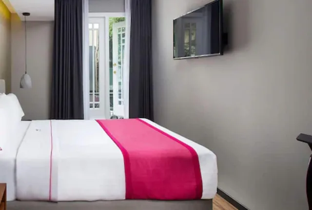غرفة جونيور بسرير كوين، Hotel MX mas reforma CDMX, Trademark Collection by Wyndham 1/2