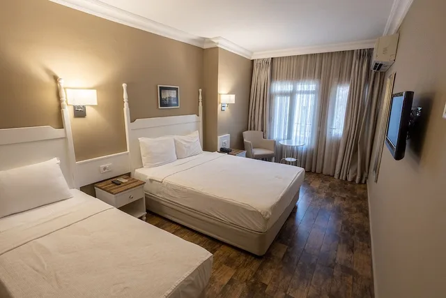 غرفة قياسية بسريرين منفصلين بإطلالة على الحديقة، Olbios Marina Resort 1/1