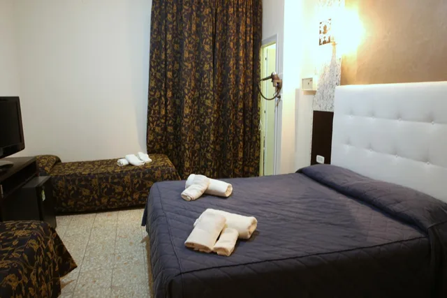 غرفة رباعية، Hotel Busignani 2/9