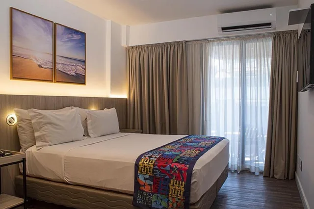 غرفة ديلوكس بسرير مزدوج بشرفة، Anna Suites Ipanema 1/6