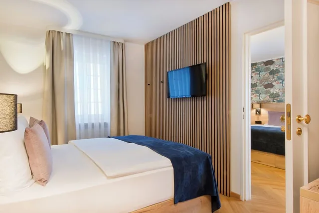 غرفة عائلية بسرير كينج وسريرين منفصلين، Atrium Hotel Amadeus 4/10