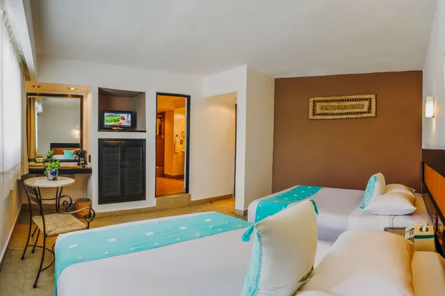 Room, 1 Queen and 1 Double Bed, Jungle View، Hotel B Cozumel 4/7