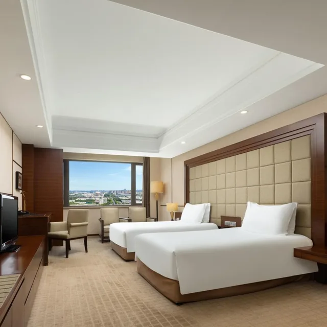 غرفة ديلوكس مفردة بسريرين منفصلين، Millennium Hotel Wuxi 1/5