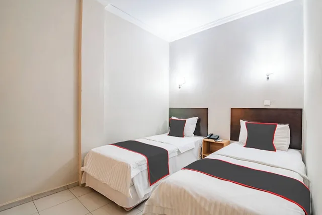 غرفة قياسية بسريرين منفصلين، Collection O 94063 Olgaria Hotel 1/3