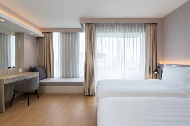 غرفة غراند ديلوكس بسريرين منفصلين وسرير كينج، Aster Hotel And Residence Pattaya 1/5