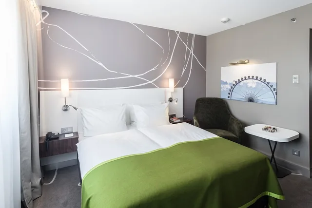 غرفة بريميوم بسرير كوين، Holiday Inn Munich - City Centre 1/3