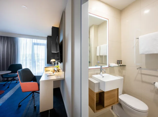 غرفة ديلوكس بسرير كينج وسرير كوين، Novotel Melbourne Preston 5/6