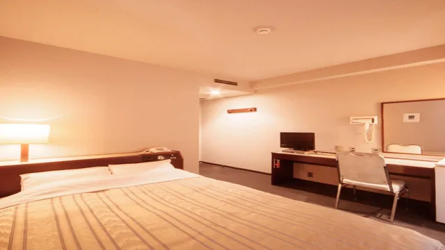 غرفة بسرير مزدوج في المبنى الرئيسي للمدخنين، Plaza Inn Mizusawa 1/1
