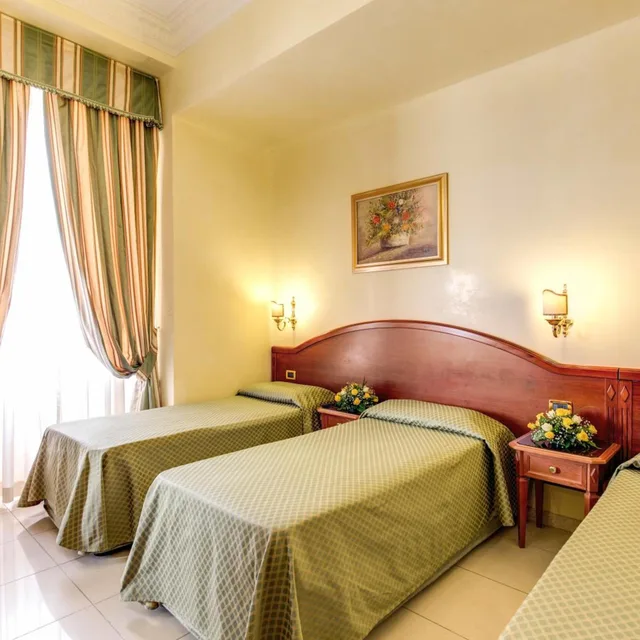 غرفة ثلاثية بسرير فردي، Hotel Contilia 1/3