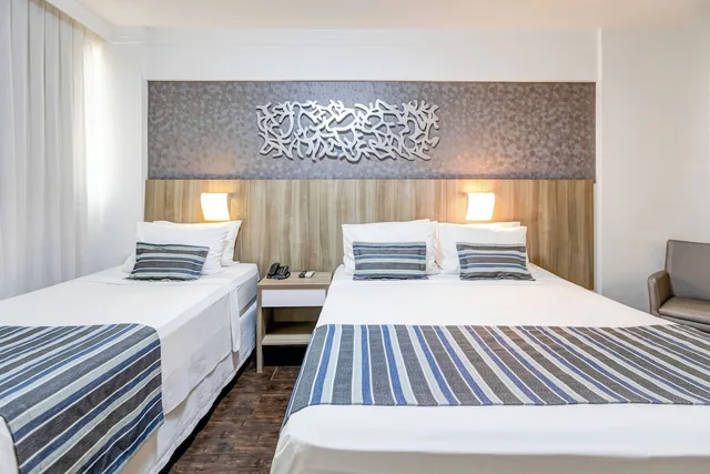 غرفة ديلوكس ثلاثية بسرير كوين وسرير فردي، Allia Gran Hotel Pampulha Suites 1/10