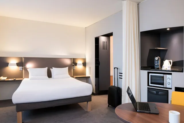 جناح سوبيريور بسرير مزدوج وسرير فردي مع أريكة، Novotel Suites Paris Stade De France 8/10